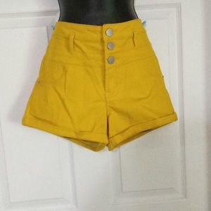 Two pairs of NOBO size 13 shorts yellow and beige